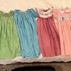 FOUR size 5 smocked dresses. All good condition